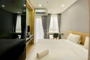 Comfort and Modern Look Studio Room Ciputra World 2 Apartment By Travelio